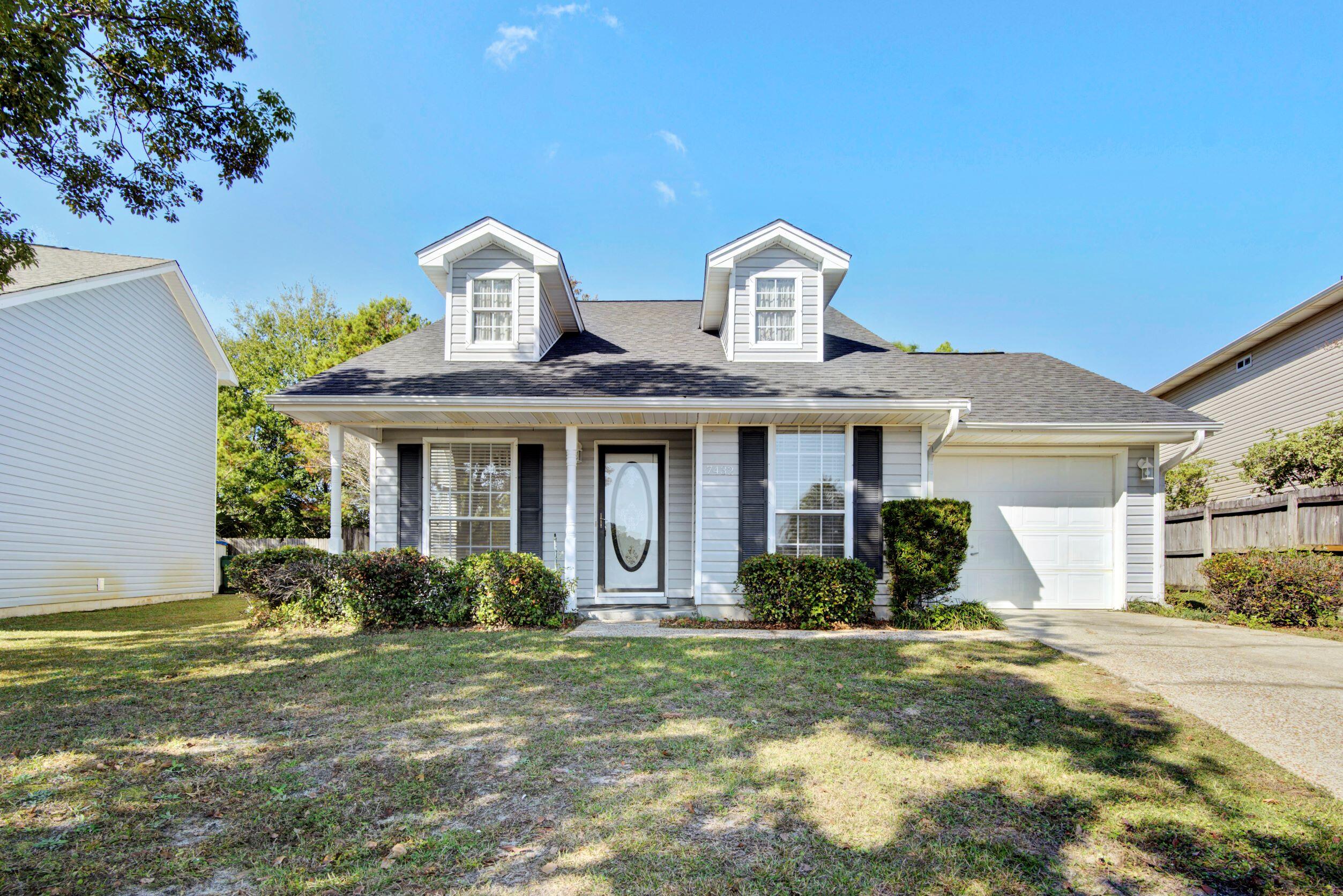Welcome home to this adorable 3 bedroom, 2 bath Florida cottage located on one of the few end lots in the community! This home features an open floor plan with vaulted ceilings in the living room. Downstairs you will find two bedrooms and a bathroom, and upstairs is the oversized master bedroom with attached bath and walk in closet. Other features include in a fenced in backyard, attached garage, interior laundry, and eat in kitchen. Roof was replaced 2021. Don't delay in making this adorable property your next home or investment property!