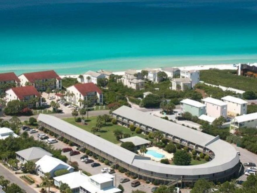 Excellent investment opportunity in beautiful Seagrove Beach! These units rarely come on the market and don't last long. If you are looking for an affordable condo on 30A with easy access to the beach, this unit will not disappoint. Hidden Beach Villa's convenient location in the heart of Seagrove and lovely community pool make it ideal for a primary home or short term and long term renting. Unit is on the east end of first floor and has a  private patio overlooking the pool and green space.