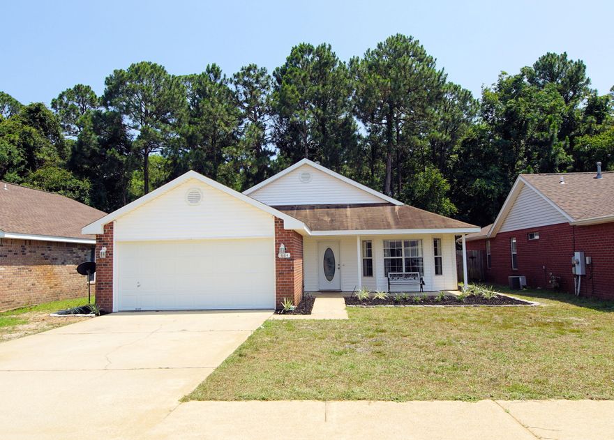 Great home in the desirable Emerald Village in Fort Walton Beach with 4 bedrooms and 2 bathrooms and built in year 2000! New roof being offered with acceptable offer! This home has 1778 square feet, plus 832 sq foot enclosed patio,and a large open deck! Enter the home and notice the dining room with large picturesque windows overlooking the front yard! The home has an open floor plan with the kitchen opening to the living room! The kitchen has many cabinets and a pantry! in addition there is a breakfast bar that seats 4! The living room features a fireplace and is a large open area perfect for a good size sectional couch!