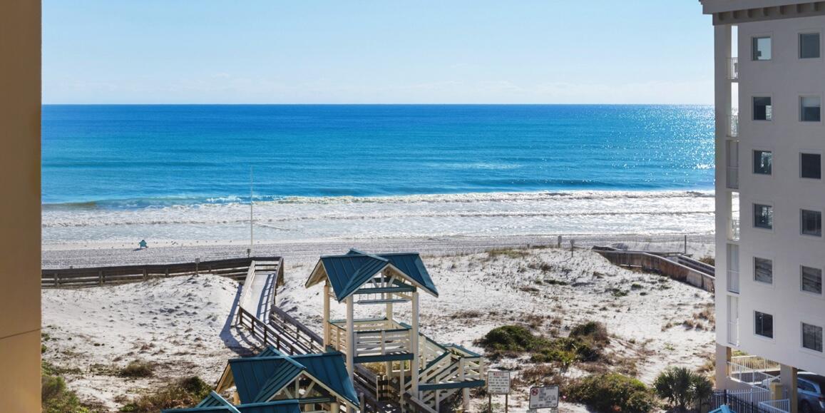 Relax in luxury at Azure #522. This stunning 3BR/2BA condo is located on the gorgeous Okaloosa Island and offers two full sized pools, two hot tubs, and a umbrella splash pad for kids to enjoy! The 10' balcony has an incredible view. There is a king bed in the master, twin bunk beds in one guest room, and two full beds in the other guest room to sleep 8 guests comfortably. TV's are located in every bedroom and the living room, stainless steel appliances and a private balcony with a beach view complete this incredible condo. Other amenities include tile floors, mirrored walls, garden tub in master bath. The pier, shopping and several restaurants close. No need to worry about parking! Plenty parking spaces in the 2 covered parking decks, and a huge storage cage.