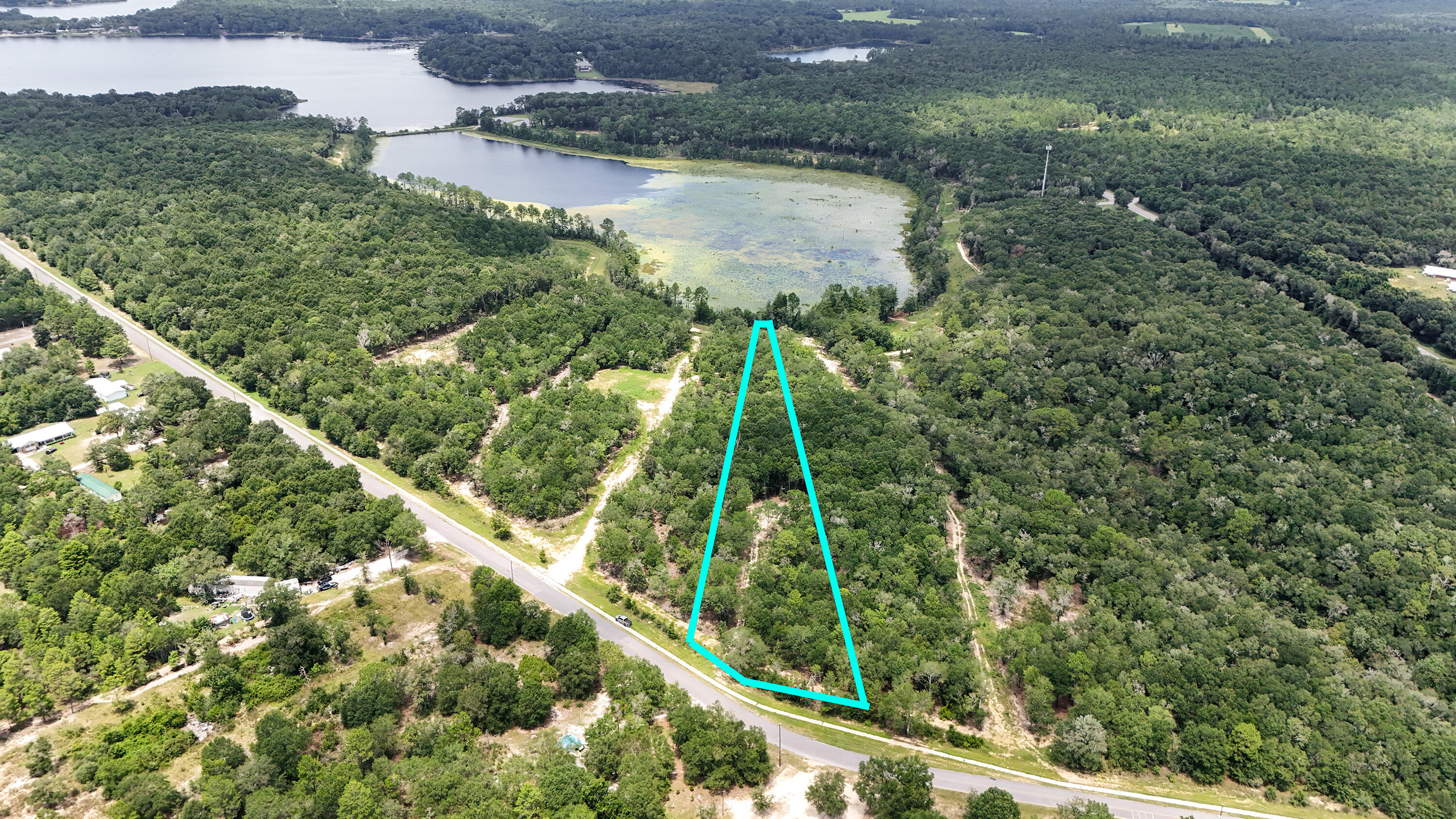 FOR SALE - Large 2.54 Acre Luxury Lakefront Lot in Seacoast Estates - Located on Holly Lake in DeFuniak Springs, FL. This stunning 2.54-acre lakefront is one of the Largest Lots and it is Priced to sell!! Seacoast Estates is Northwest Florida's newest exclusive residential community. This lot offers a rare opportunity to build your dream home on a serene, expansive homesite with direct access to Holly Lake. Conveniently located near I-10 for easy access to the beaches of the Emerald Coast, Crestview, or Tallahassee. Enjoy the freedom to build your own private dock and fully enjoy lakefront living. Priced to sell--don't miss this exceptional opportunity!