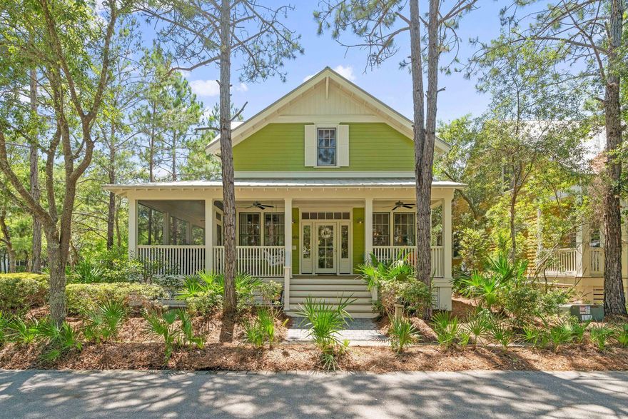 This 5 bedroom Beach House is tucked away on a corner lot in phase 3 of Watercolor.  The home has a large wrap around porch which is partially screened to enjoy summer days after a day at the beach or pool! The home offers an open floor plan allowing for great family time and entertaining.  The home offers wood flooring throughout and white shiplap walls. The kitchen offers a center island, kitchen aid stainless steel appliances to include refrigerator with icemaker, gas range, exhaust hood, dishwasher and microwave, an abundance of both counter and cupboard space and overhead transom cabinets that adorn the breakfast bar.  Decorative beach color backsplash fits perfectly in this Watercolor beach house.  This home offers the must have large pantry with wooden shelving.  Just down the