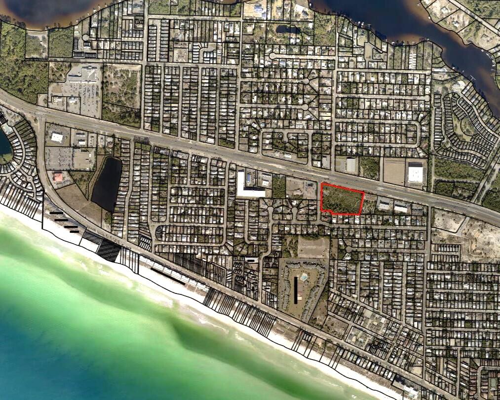 PRIME EXPANSIVE 4.5 ACRE+ COMMERCIAL PARCEL W/ WIDE FRONTAGE ON PANAMA CITY BEACH PKWY. Think of the possibilities for this large, rare commercial parcel with broad frontage on Panama City Beach Pkwy's with it's high traffic count, visibility and ease of ingress and egress. Better opportunities for this size of footprint and frontage do not exist. 16 miles to Panama City Beach International Airport, 6 miles to Panama City Beach Pier Park Shopping Center, 3 miles to Wild Heron Resort and Shark's Tooth Golf Club, 3 miles to Panama City Beach's beautiful Emerald Coast Beaches, 12 miles to Latitude Margaritaville Watersound, 4 miles to Rosemary Beach and Scenic 30A. Just to name a few.
