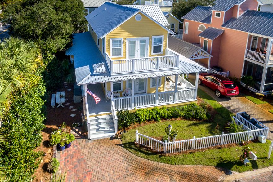 Ready to sell in tip top condition  offered mostly furnished! South of 30A steps to the community beach access in gated Sunrise Beach. Listen to the waves crashing from a welcoming wrap-a-round porch. Situated on a cul-de-sac, the 4 bedroom, 3 bath home is easy to maintain with a metal roof and hardie board siding. GORGEOUS pine floors are throughout the main living areas, stairs and 2nd floor master with Gulf Views via the private balcony! A large guest bedroom with en-suite bath completes the 2nd level. The 1st floor is bright & spacious. The kitchen, open to the living room and generously sized dining room with bay window, boasts LG stainless steel appliances, maple cabinets, a single basin sink & red quartz countertops. 2 guest bedrooms and full bath complete the 1st level.
