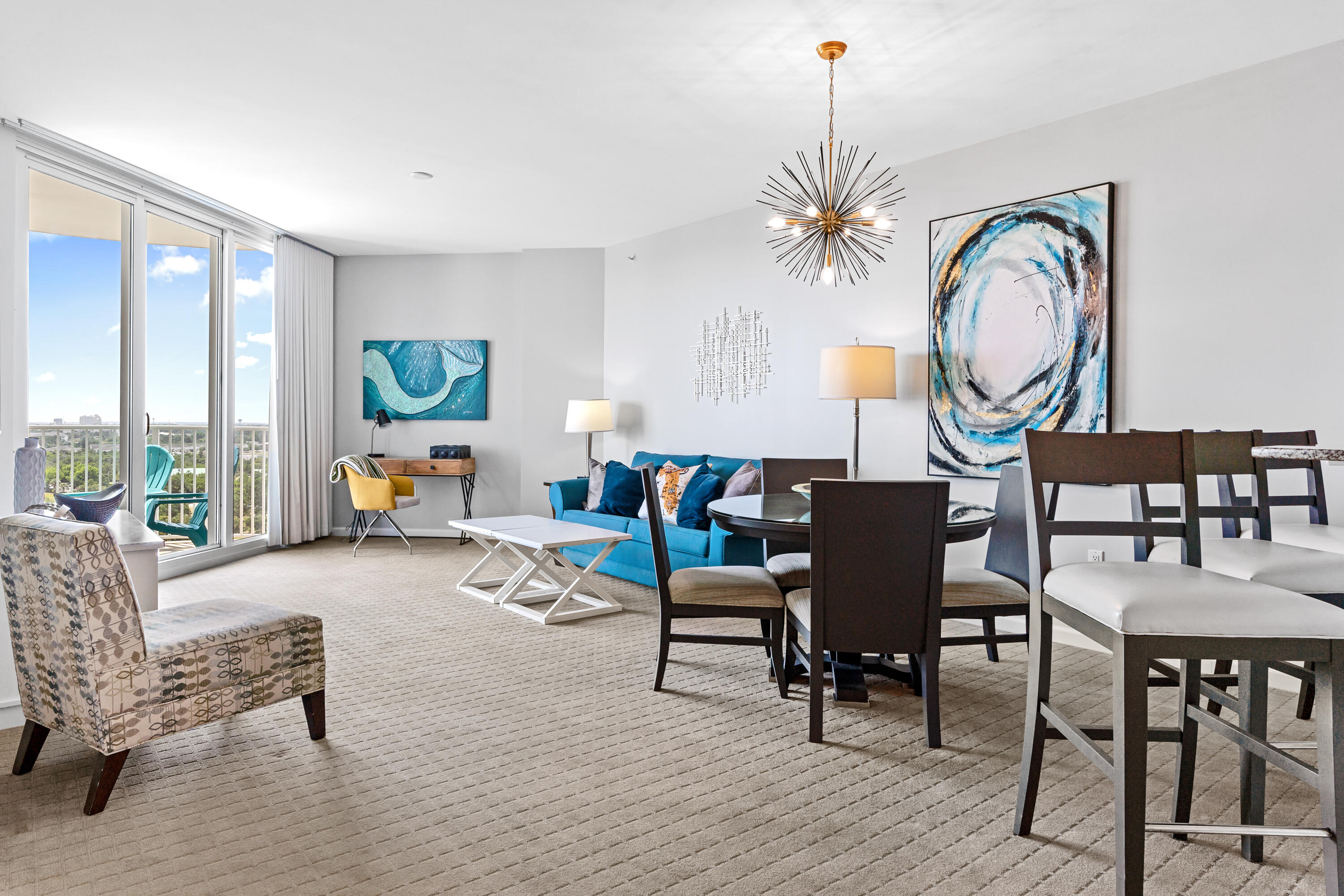 Sweeping westerly view of the Destin skyline in this TOP floor unit. Open concept living and dining area, as well as an expansive and inviting balcony just perfect for taking in the Emerald Coast sunsets. Recent upgrades to the unit include painted kitchen cabinets, appliances, paint, light fixtures and MORE~ Enjoy the many onsite amenities, including a lushly landscaped pool area boasting Destin's largest lagoon pool with waterfall features, a kiddie pool, hot tub, and splash pad, as well as a playground, fitness center, and tennis and basketball courts. Want your toes in the sand?