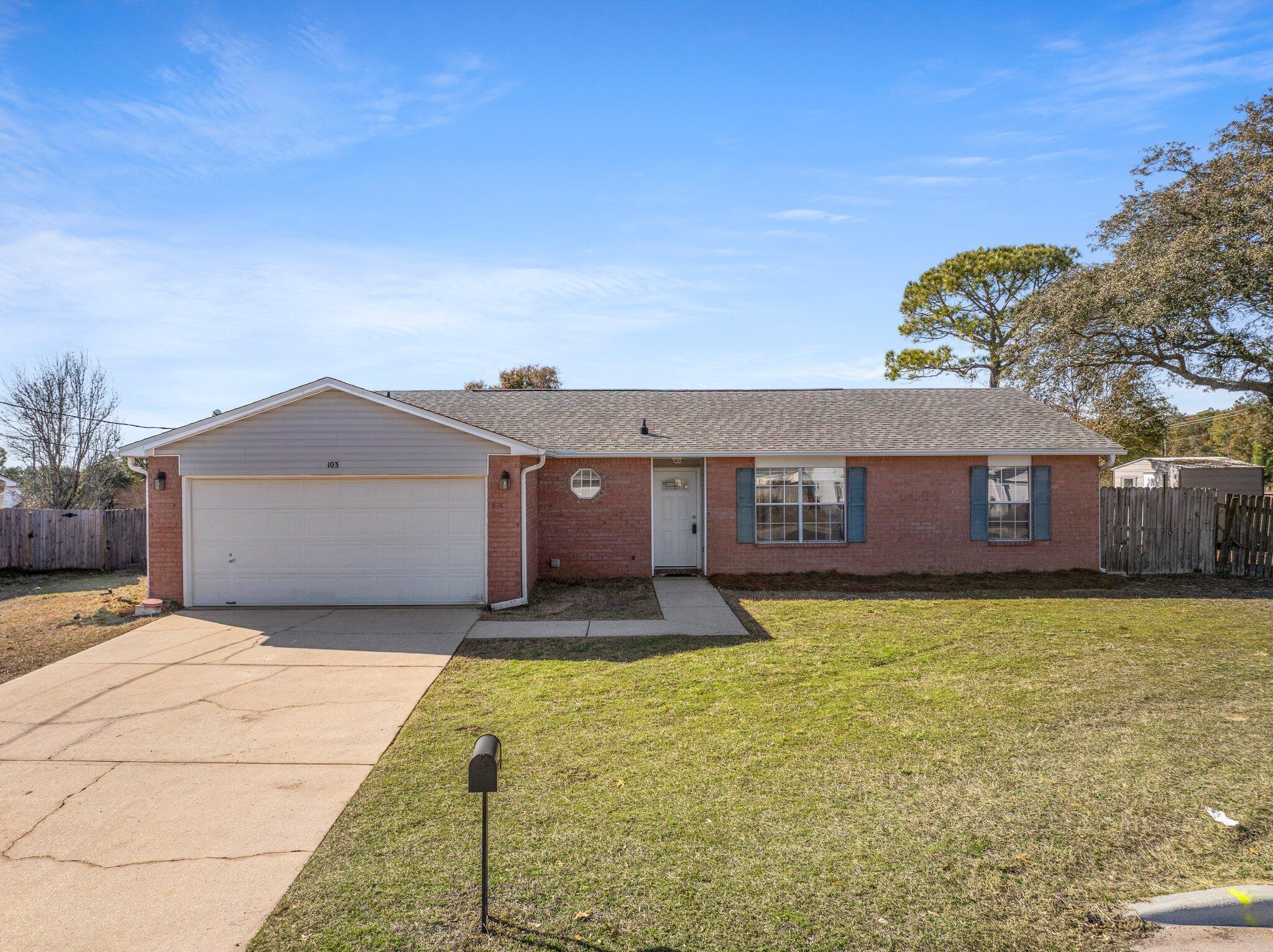 NEW FENCE installed on both front sides of the property. All brick Mixed-Used Property on .33 Acre by PJ Adams Across from the Dollar General! Ideal for residential or business use! Convenient location with high visibility. This spacious property offers quick access to Hwy 85 and located approximately 7 miles from Duke Field, 18 miles from Eglin AFB, 30 mins to the beach and 40 mins to Destin. Inside, you'll find a generously sized family room, a cozy kitchen with breakfast nook, separate dining area and a roomy master bedroom that can fit a king size bed. Situated on a large corner lot, there's plenty of space for your RV or boat. Unwind in the spacious Florida Room while taking in beautiful sunsets. Buyer to verify all dimensions and details. Roof is 2017.