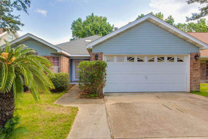 Charming brick front home conveniently located in the heart of Destin only a few blocks from the harbor. Split bedroom open floor plan affords plenty of privacy as well as a large living area for entertaining and gathering around the fireplace. Lots of cabinets and storage space available. Sold furnished except the fish in the master bathroom,small wall shelf in the master bedroom, cedar chest in master bedroom, and paintings in living room.