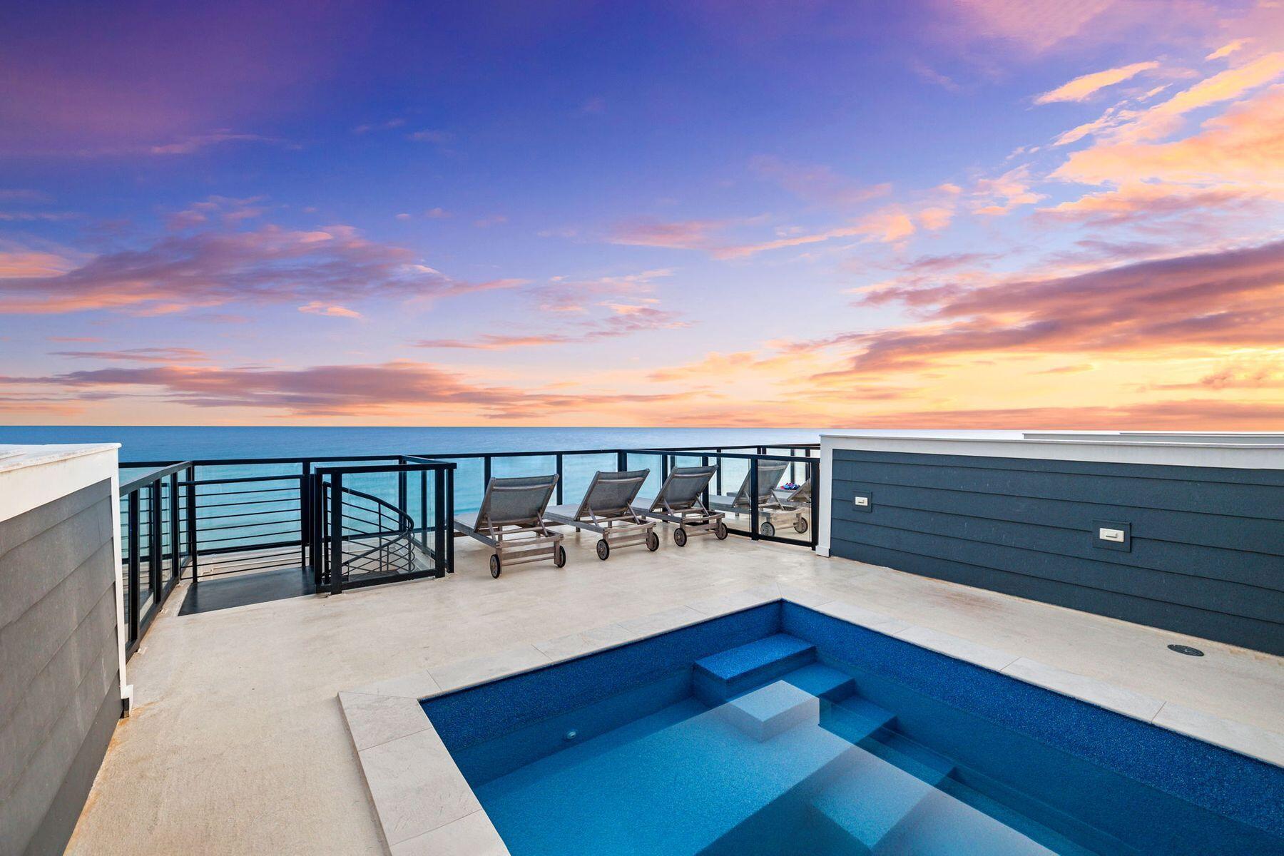 Enjoy panoramic Gulf views from every floor of this stunning beachfront townhome! One of only ten units in the building, this luxury villa boasts a private rooftop pool, a theater room, and two gulf-front primary suites with private waterfront balconies and ensuite bathrooms. On the first floor, the open concept living area features a designer kitchen with Wolf and Sub-Zero appliances and retractable glass sliders opening onto the beachfront patio for easy access to the beach walkover. The private elevator offers convenient access to all four floors. With private beach access, elegant design, and a premier location in Crystal Beach, Henderson Beach Villas lends itself to a sophisticated coastal lifestyle, making it an ideal second home or rental investment.