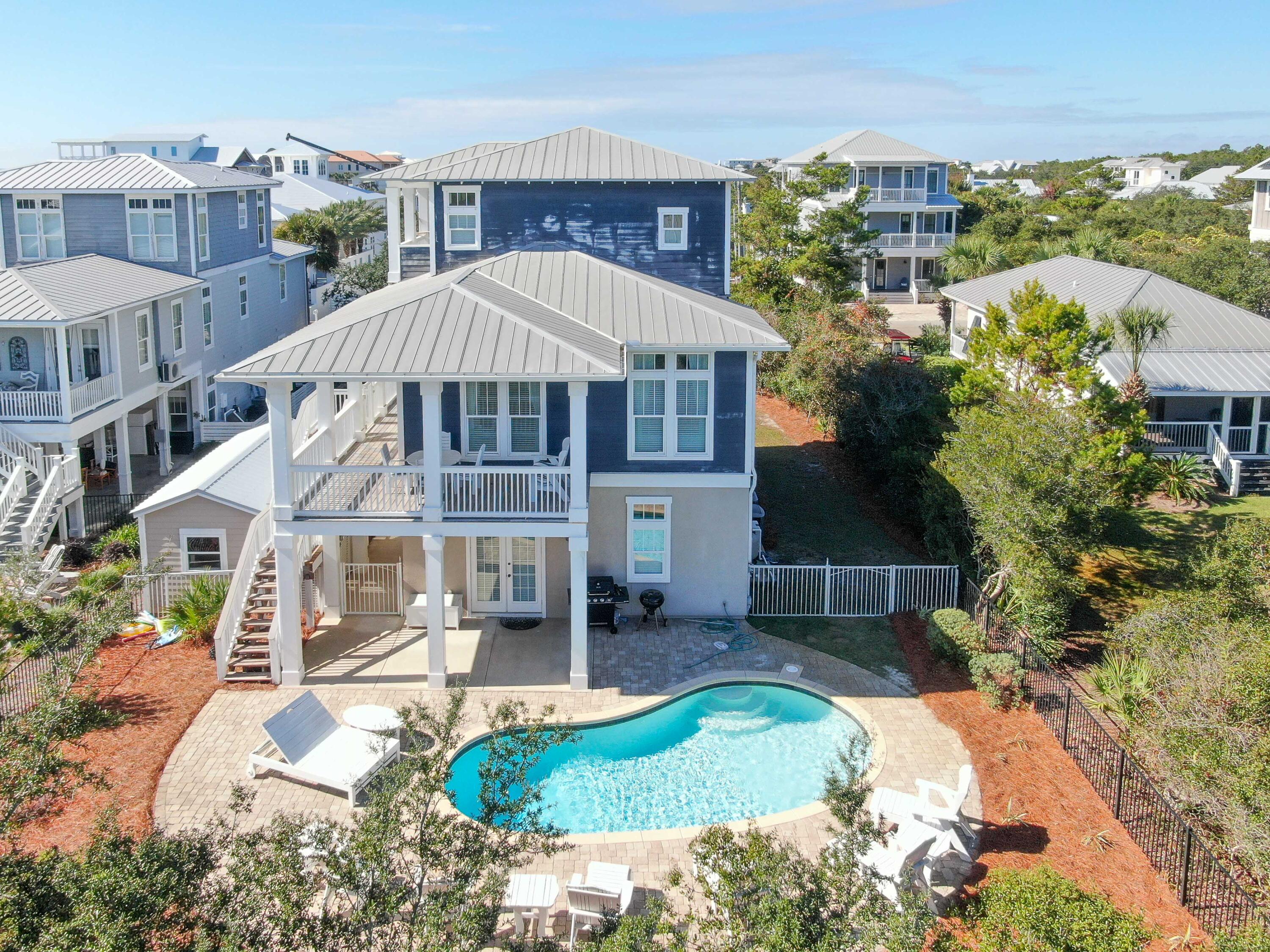 Great location! A Florida style cottage nestled in the Seacrest Beach area. Enjoy the great views and fabulous space for entertaining from the fabulous decks or from the poolside patio. Large bedrooms ! Drive your golf cart or a short 2 block walk to your own deeded beach access. Lot is large enough to add 2/3 car garage with guest cottage.. Home is a vacation rental.No Homeowner Association fees.