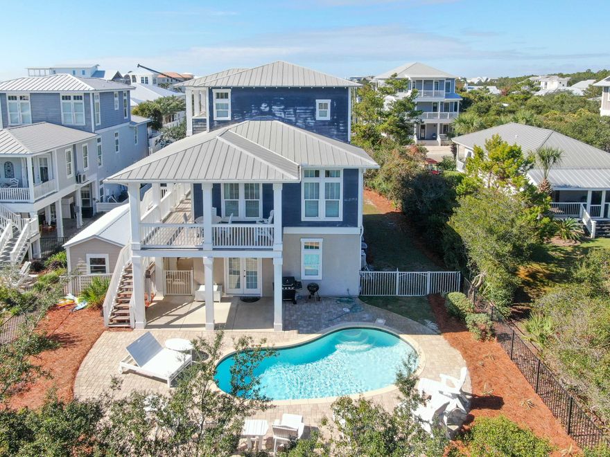 Great location!  A Florida style cottage nestled in the Seacrest Beach area. Enjoy the great views and fabulous space for entertaining from the fabulous decks or from the poolside patio.  Large bedrooms !   Drive your golf cart or a short 2 block walk to your own deeded beach access.    Lot is large enough to add  2/3 car garage with guest cottage..   Home is a vacation rental.No Homeowner Association fees.
