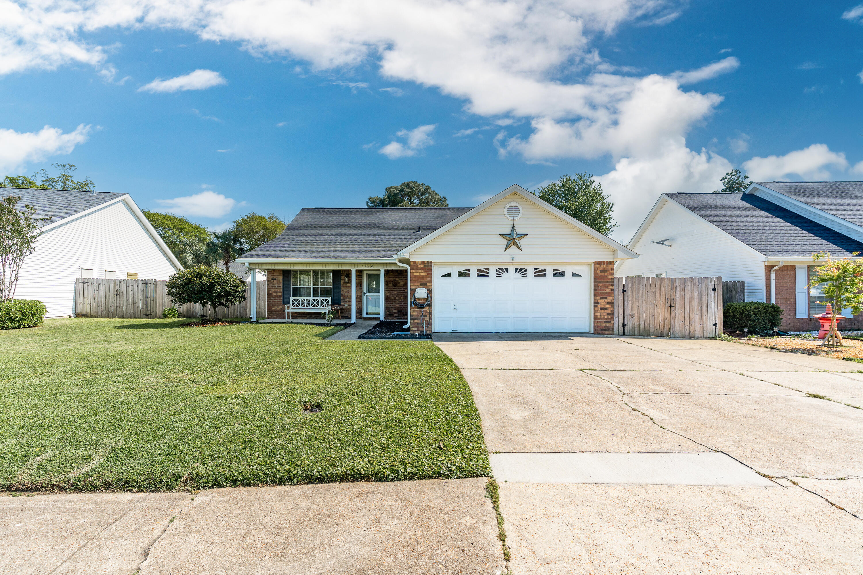 Don't miss out on this incredible LOCATION! Enjoy the convenience to restaurants, shopping, salons, and Tiger Point Park. It's just a quick 10-minute drive to Pensacola Beach and only 15 minutes to Downtown Pensacola. Plus, you have easy access to Garcon Point Bridge and Navarre Beach, offering you all the luxuries of coastal living. Sterling Point is one of the most sought-after subdivisions in Gulf Breeze, located in the highly regarded Oriole Beach Elementary and Gulf Breeze Middle/High School district. The home welcomes you with low-maintenance landscaping and a charming covered front porch. Step inside to find a well-designed floor plan that perfectly blends comfort with entertaining space.