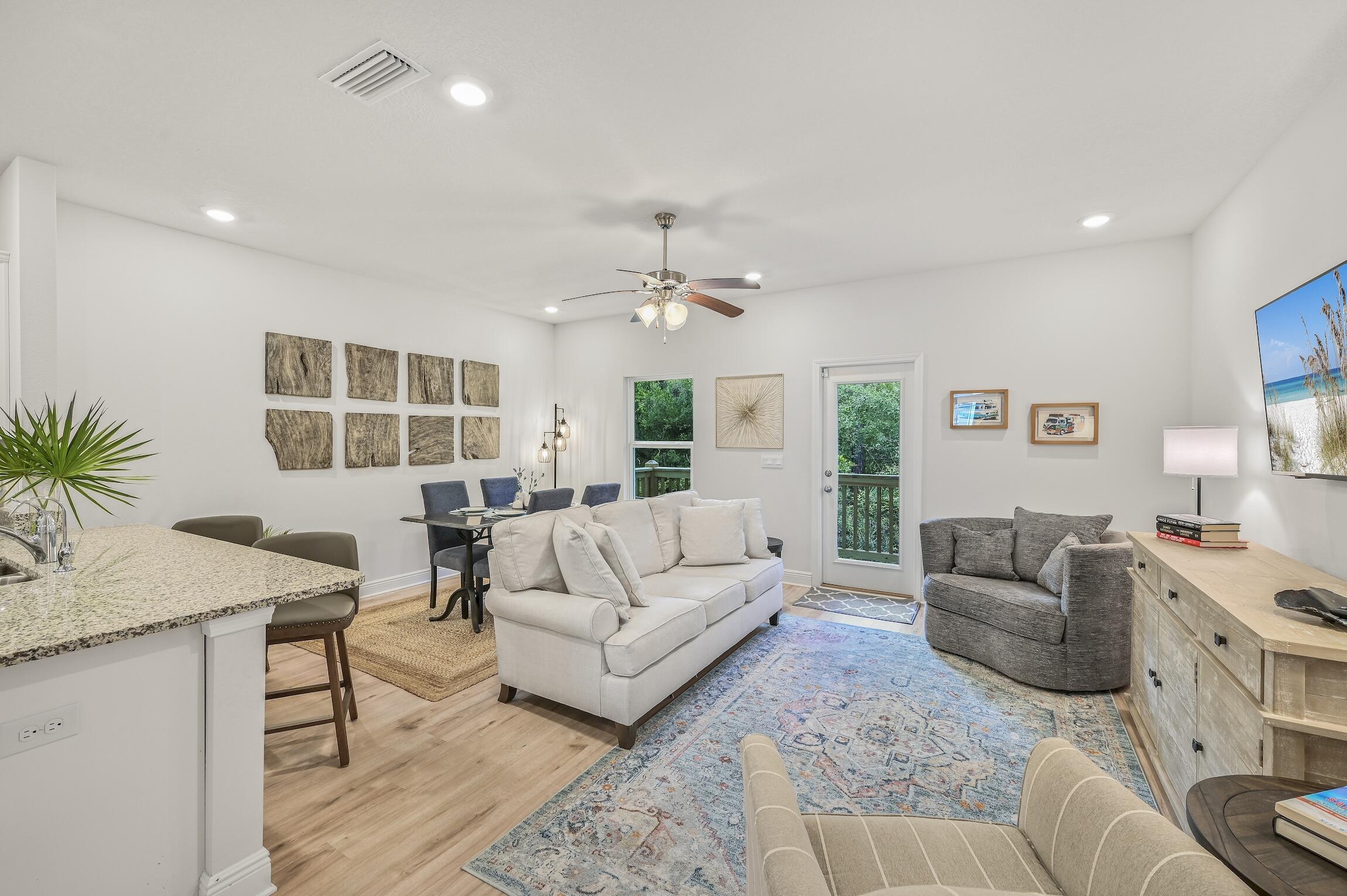 Like new townhome in the heart of Santa Rosa Beach! This home has served as a second home to the owners and is in impeccable condition! Located 1.5 miles from Hwy 98 and all that Grand Blvd with restaurants, shopping, movie theatre, and the hospital! Approximately 4 miles to Silver Sands Outlet Mall, 3.5 miles to Topsail Hill State Park, and 5 miles to Dune Allen beach access on Scenic Hwy 30A. This home is 1553 square feet, 3 bedrooms, 2.5 bathrooms, 9 foot ceilings, luxury vinyl throughout, ivory shaker style cabinetry and interior doors, brushed nickel hardware and a one car garage! The bedrooms are split for privacy. Upgrades include a Smart Home Technology package which includes a KwikSet keyless entry, Skybell doorbell, automated front porch lighting, an Echo Dot, and Quolsys touch
