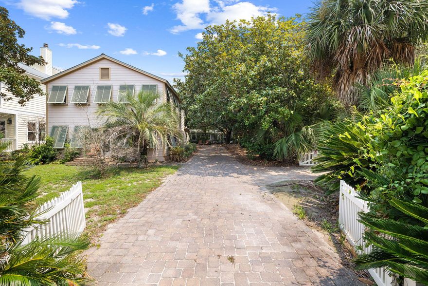 A rare opportunity has arisen to own an oversized corner lot in the coveted Old Seagrove neighborhood, West of 395. This traditional 1980 beach cottage offers three King bedrooms, sleeping porch and two baths. The expansive 70 x 125 sq ft lot is conveniently located steps from two neighborhood beach accesses and a short stroll to the renowned restaurants and shops of Seaside.Whether you preserve the existing home or embark on a new development increasing the square footage and incorporating Gulf views. This opportunity is as rare as it is extraordinary.Plans available for remodel & addition for  current home.