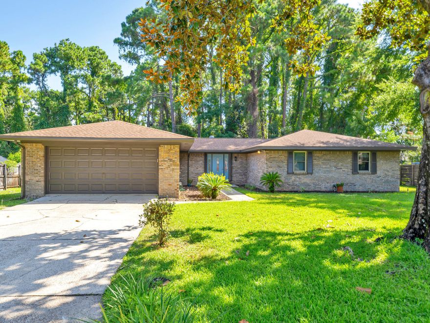 Welcome to the quaint neighborhood of Kell Aire Gardens. Tucked away in Destin, this neighborhood has two parks, a pond and is close to shopping, beaches and restaurants. This lovely home features three bedrooms two and half baths on a large almost half acre lot that backs up to a creek. The home has an open floor plan, with an updated kitchen that includes stainless appliances, quartz countertops and plenty of cabinet and countertop space to make any chef happy. The kitchen is open to both the dining and living area. The owner has made the following improvements: HVAC 2015, Water Heater 2016, Kitchen remodel 2015, Hurricane Shutters for the front and sliding glass doors  2014 and Impact windows 2009.