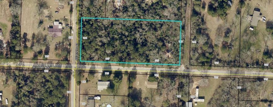 2.06 Acres Sold for LAND ONLY heavily dense wooded property. There is a old abandoned home located on property, 2 story but is not inhabitable or salvagable. DO NOT ENTER home NOT SAFE due to collapsing floors and roof. Enter at own risk. Utilities may be existing but not confirmed. Survey available. SOLD AS IS, CASH ONLY.