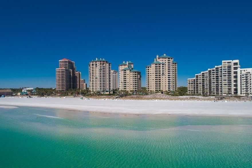 take a virtual tour through the photo link ! Escape into lavish Gulf front living at this spacious four bedroom beach retreat, located within the heavily amenitized Sandestin Golf & Beach Resort. Situated atop the crystalline sands sprinkled along the Gulf of Mexico, this oversized wrap around balcony provides endless opportunities for world-class vistas, as well as charming al fresco dining and entertaining.The traditional styling of this coveted corner-unit floorplan adopts to an array of design styles, providing timeless elegance, Southern comfort, and beach-timing living all within the privately gated, non-rental community of Southwinds III.This idyllic condo provides a superb offering for those enchanted by coastal living, whether as a secondary retreat or new primary residence