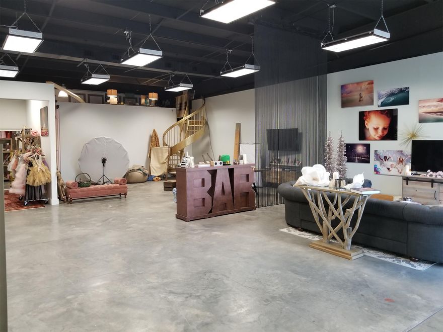 Expand your real estate portfolio with this exceptional commercial office centrally located in Santa Rosa Beach within the 393 North Business Park. The expansive open floor plan lends itself to many options. There are concrete floors throughout, exposed industrial ceilings, three office vignettes, half bath with plumbing for a shower, and a conference area adjoined by a spiral staircase with loft space above. The back of the space is great for additional storage, office materials and supplies. Approximately 2161sf.