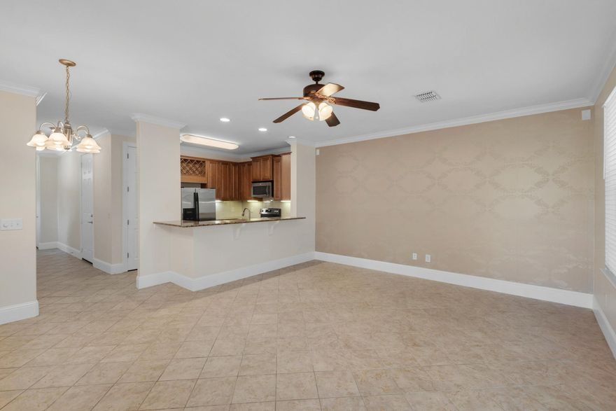 Under contract with a 24 hour Kick-out Clause. RECENTLY UPDATED! This, rare-to-find, end unit has new interior paint throughout, brand new carpeting, a new stove and all tile has been steam cleaned. The HVAC was also purchased in May of 2017. There is great privacy off the rear covered patio with views of the nearby pond. The neighborhood ''overflow'' parking is just steps away.