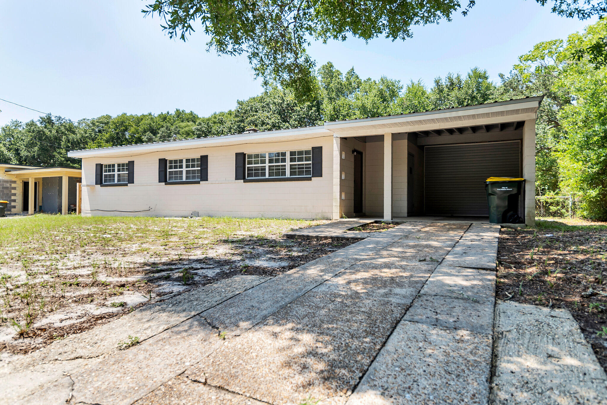 Adorable block house with on a large lot. 3 bedrooms and full bath. Nice patio out back for entertaining. Kitchen is nice size and right off patio. Enjoy this quiet neighborhood that is central to everything! Beaches, shopping and more!! Schedule a showing today! 850-729-0399 or apply at rentwithbsr.com