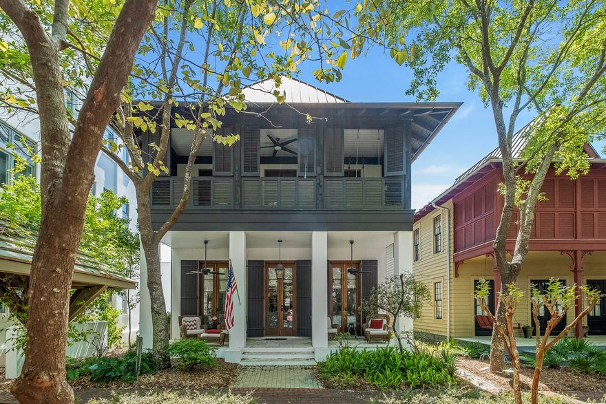 Gorgeous cottage and carriage house on a pocket park on the north side of Rosemary Beach.