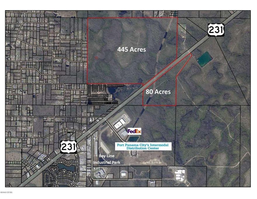 Approximately 80 acres with +/- 3,700 feet fronting U.S. Highway 231. This property is currently zoned AG-1. Located in Bay County and just 1/2 mile north of the main entrance to Port Panama City's Intermodal Distribution Center. (Commerce Boulevard. With land use change to industrial and incorporation into Panama City limits, the property would make ideal commercial or industrial site and is located adjacent to the Intermodal Distribution Center. The new 250,000 sq. ft. FedEx distribution center is now under construction. Rail Service available. Measurements are estimates only.
