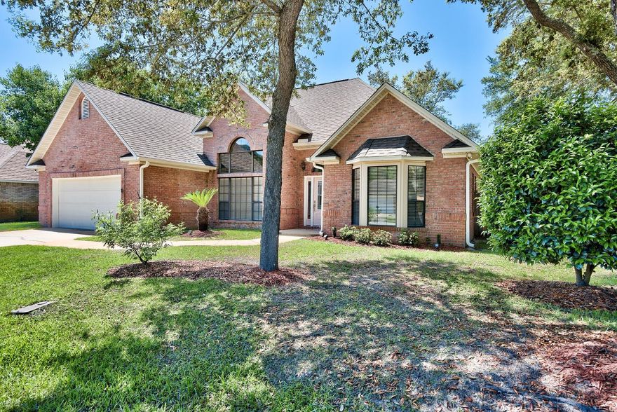 BEAUTIFUL, RENOVATED HOME IN GREAT NEIGHBORHOOD! Gorgeous, real Brazilian Koa wood floors, high ceilings, & up lighting above the fireplace grab your attention immediately in this fantastic home! Entertain in style from your formal dining room or grab a casual meal in the breakfast nook or at the eating bar. Custom cabinetry, granite counters,SS appliances & pantry accent the beautiful kitchen. Offering a split floor plan, the spacious master, located away from the other bedrooms, adjoins the large master bathroom w/his her sinks, new granite counter, walk-in shower, jetted tub & walk-in closet. Other features include office/4th bedroom, 1/2 bath w/access to yard & laundry area. The patio w/gas hookup allows you to enjoy the Fl. lifestyle & the fenced backyard w/sprinkler