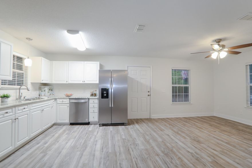 100% Move In Ready!!!- 8 foot Privacy Fence being installed along right side of home from front to back for privacy! Lowest priced home in all of Navarre and all fixed up.. 100% Move in Ready Home!2006 Built 3/1 1100 Feet 100% Rehabbed. 2022 Roof 2007 AC 2022 Hot water heater . Updated kitchen and baths with granite and stainless steel appliances.  new flooring, new paint in and out , new fans and lights ...