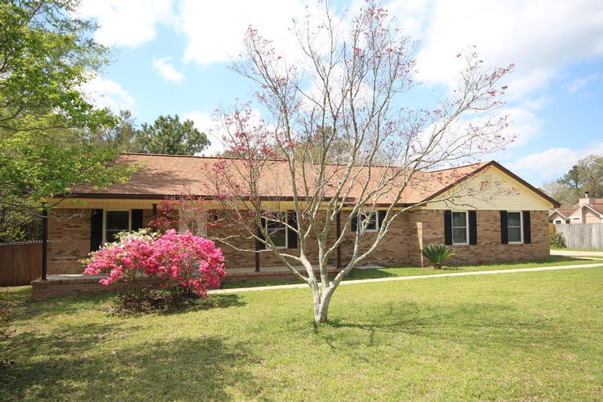 BEAUTIFUL, upgraded home ready to move-in! South Crestview,large/level lot (.41 acre) and in county taxes only! In Foyer you are greeted by a wood burning fireplace in the living room/dining area,that overlooks the back screened porch. Kitchen has all new stainless steel appliances and large pantries! Large Master Bedroom/Bath has access to the back porch. Updated Master Bathroom leads in to the large 10'9x8'3 Walk in Master closet! Home features split bedroom plan and additional updated additional Bathroom. Lots of choices for outdoor relaxation!Covered Front Porch has wooden swing attached and Back Screened porch has lots of room for seating and entertaining!Wooden play set and metal shed conveys. Roof (50 yr Warranty) & Windows replaced 2010. Gorgeous home and lot !! Backs to woods!!