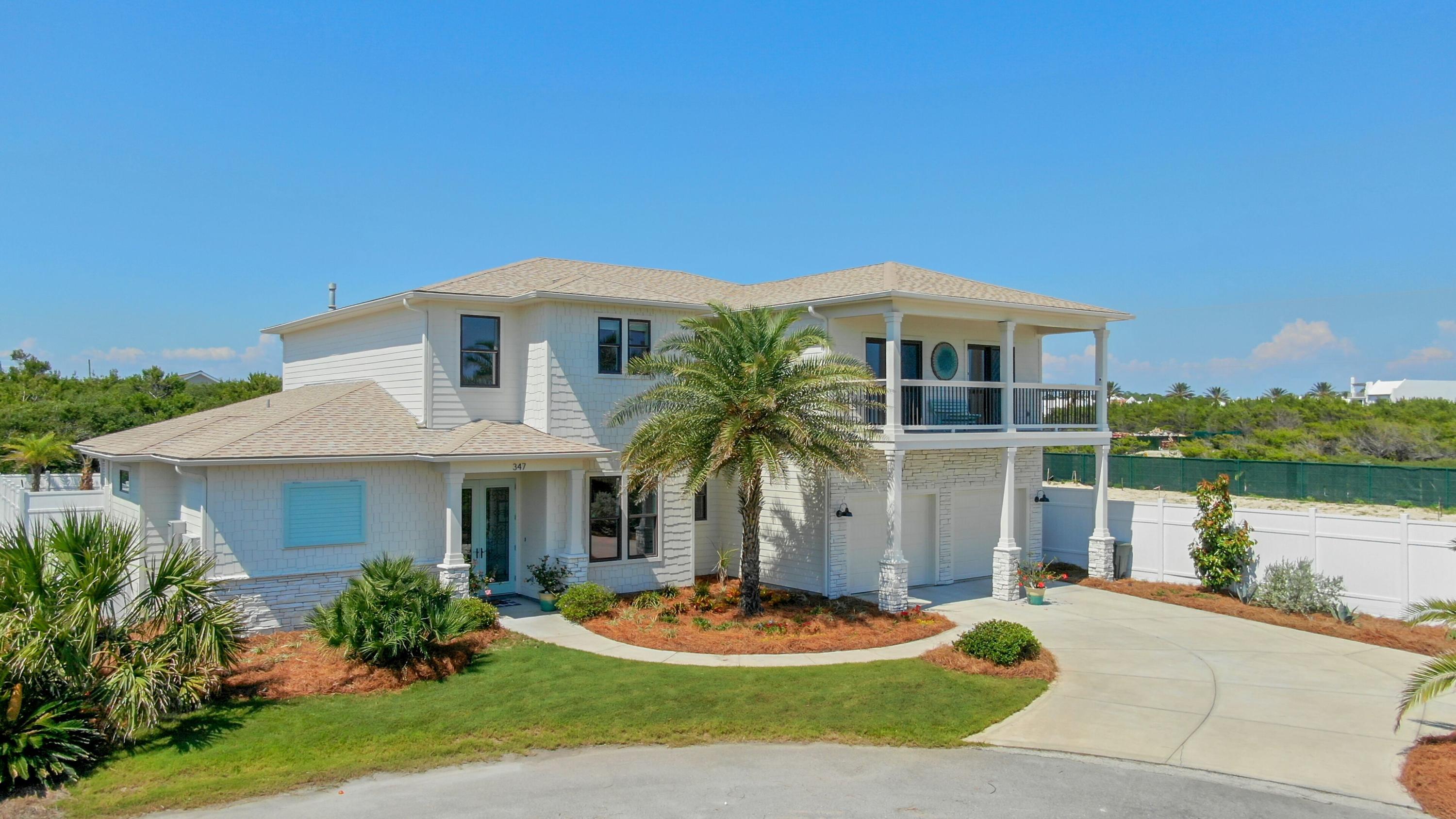 This is a unique opportunity to live in one of the only non- rental , gated communities on the south side of beautiful Scenic 30A. With a one of a kind custom home, you will find the stunning soaring ceilings of the light filled family room, a master on the first and second floor, 3 car garage, private pool, chefs kitchen with American made Viking appliances. You will be delighted by the distance between this house and your neighbors and the private beach access points right in the community. Owner is licensed real estate agent. Purchaser to verify room dimensions.