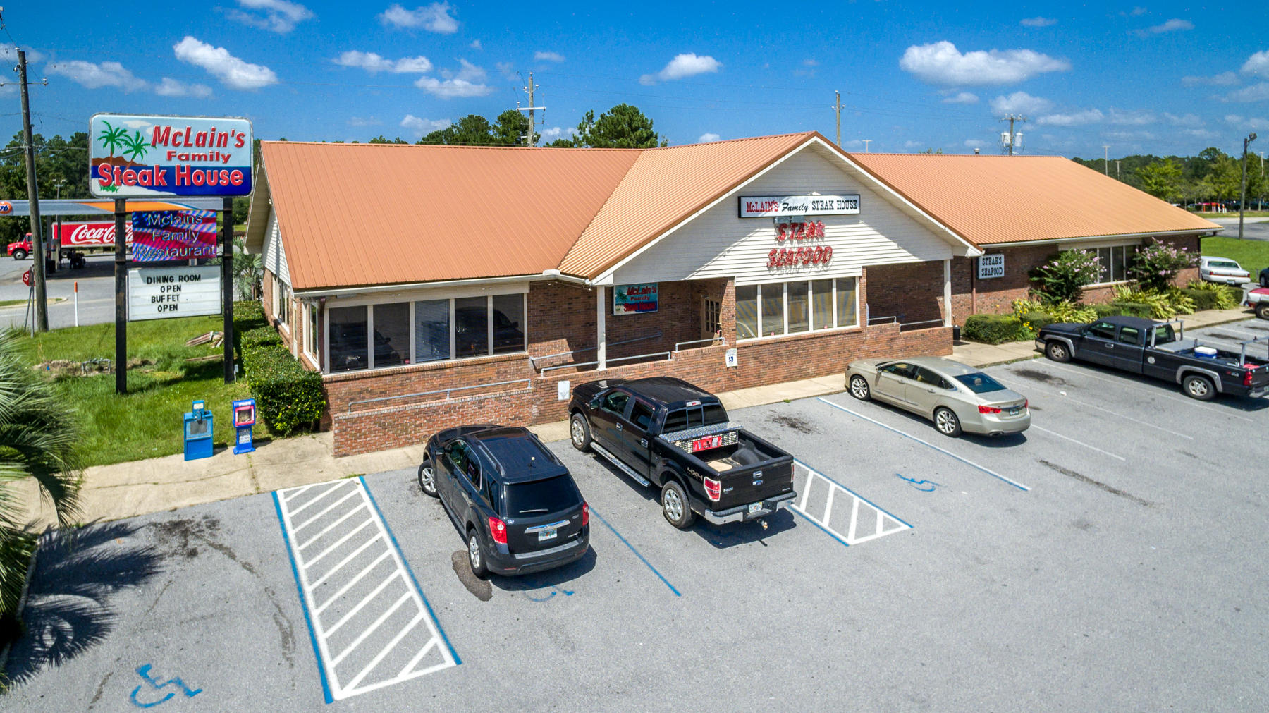 McLains Steak House located at the corner of Hwy 331 & Hugh Adams Road. turn key operation. Originally built to be operated as a Western Sizzlin Steak House. Corner lot with traffic light. First access road off I-10 when going north on Hwy 331 Major traffic stop for anybody heading home from the beach or exiting north off I-10 . Great visibility. This is a premier location for any business looking to be close to I-10 and on a primary traffic route to the beaches of South Walton County.