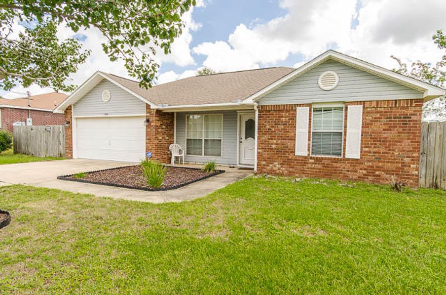 PERFECTLY PRICED 3 BEDROOM 1990s home with ENORMOUS PRIVACY FENCED IN BACK YARD!! Centrally located in Navarre, minutes from the beach and bases. Split floor plan 3 bedroom 2 bath cute and simple home offers Tiled floors throughout, Vaulted ceilings in living room a cute Kitchen featuring tiled counter tops and separate Dining area. Master Bedroom is very spacious, includes walk-in closet, bay window & master bath w/ double vanity. Outside features include spacious covered front porch, Screened in patio to enjoy the summer breeze & a Privacy fence back yard that includes double gate entry on the North end of the home for your convenience! Perfectly priced & ready for its New Owner!