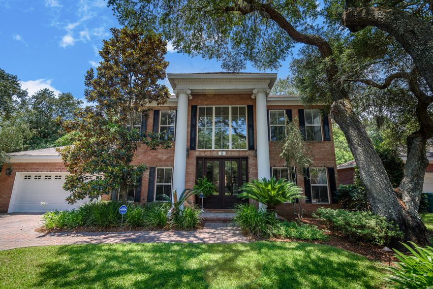 This custom, 1-owner home is a true Southern beauty! Located in a small waterfront community near both local military bases, this home features a fabulous entryway with a soaring 2 storyceiling and gorgeous chandelier. The family room is spacious and showcases a gas fireplace. The gourmet kitchen boasts upgraded hard rock maple cabinetry, a GE Monogram wine refrigerator, gas stove and gorgeous granite countertops. Interior columns separate the living and formal dining rooms,while the great room is located off the breakfast room. Low energy bills,too. Room for a pool, and the neighborhood has a community dock for residents:great fishing and beautiful views of the Intercoastal Waterway!