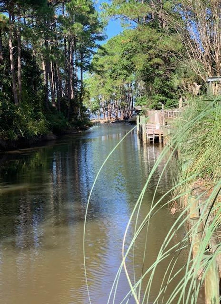 Fantastic price on this Waterfront canal lot that opens up to the Choctawhatchee Bay. Dock your boat in your backyard! Centrally located in SRB just minutes from 30A and Grand Blvd. Beautiful hardwoods, magnolias, pines and bay trees grace this property. Over 1/2 acre, this large lot can easily accommodate a sizable home w/detached garage.