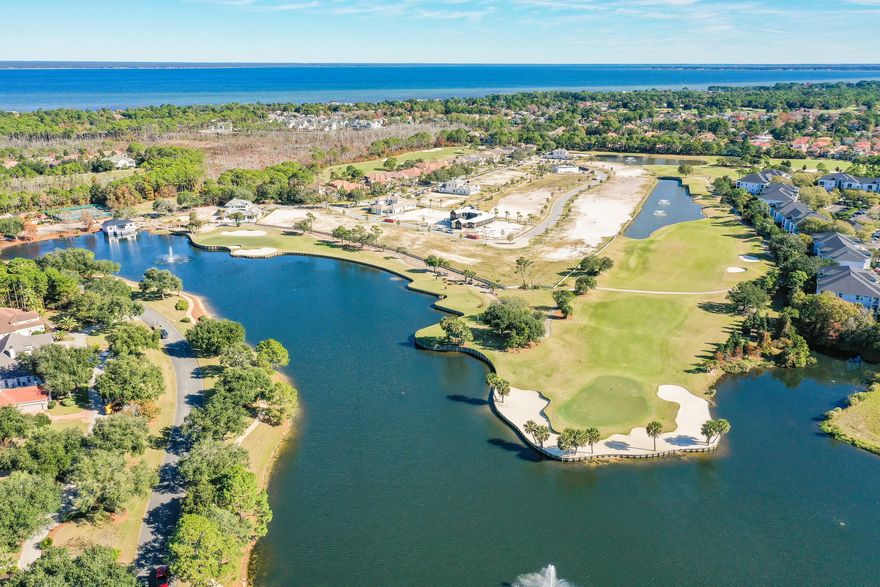 Build your dream home (on lot 1) in one of Destin's most desirable gated golf communities, Regatta Bay! The homesite is in Regatta's newest development, Tradewinds. Tradewinds will consist of 54 homes & will have a West Indies style of architecture w/ Dutch influence. Owner has the opportunity to choose an approved Architect & an approved Builder. Regatta Bay is a quiet, gated, golf & boating community that offers a LIFESTYLE unlike no other! The Regatta Bay Lifestyle is all about convenience! You can use your golf cart to get to so many fun places in minutes, including the Beach! See aerial photos! Within Regatta Bay, there is golf, swimming, tennis, pickle ball, park, playground, Regatta Bay Clubhouse, Legendary Marine & Legendary Yacht Club. Regatta Bay offers a private road that takes residents to the Destin Commons, where you'll find an array of popular men's and women's retail stores, a variety of restaurants, Whole Foods, Bass Pro, Lowes, AMC movie theater and Uncle Buck's Bowling! ALL ACCESSIBLE BY GOLF CART.