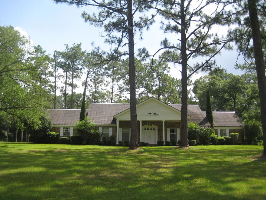 Wonderful private estate conveniently located in the heart of DeFuniak Springs with over 12 acres of privacy and a lake! Main home consists of 3 bedrooms and 2 baths with attached carport and a slate roof. Kitchen is spacious and looks out onto the great room. Bedrooms are roomy. Tile in all wet areas, carpet in the remainder. Guest house is one bedroom and one bath, perfect for mother-in-law quarters or out of town guests. Property is gorgeous and features pecan trees, some woods, numerous fruit trees and a muscadine vineyard. Also on the property is a one car detached garage/workshop. And did I mention a great and scenic lake? Make your appointment to see this rare find in DeFuniak Springs today! Seller will pay for a Home Warranty!