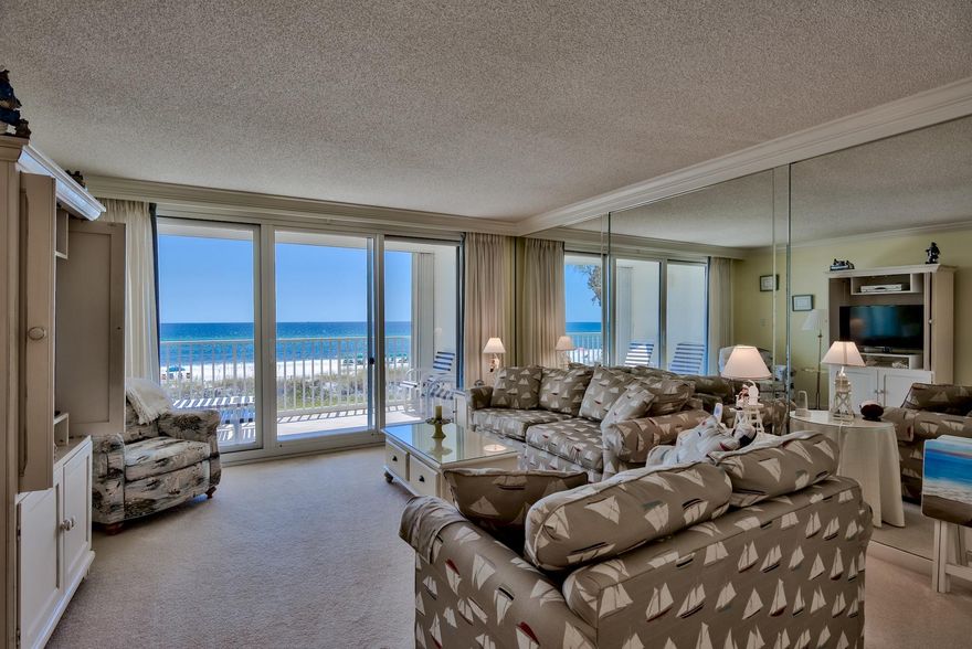 The views are incredible in this 2nd Floor West End Condo with sunset views or watch the dolphins swim by in the morning all from your bed. There is a wrap around 37 foot balcony off the Master Bedroom and a separate 15 foot balcony off of the living area, both with hurricane shutters. It even has a Second Gulf Front Master Bedroom with a floor to ceiling 12 foot window overlooking the Gulf. This condo has 2 A/C units and the master bath is 19x18 and has 2 closets. The 2nd Gulf Front bedroom is ensuite and there is a third bedroom and bathroom. The Grand Mariner is a non-rental building with a 3 month minimum rental. 300 feet of private beach.