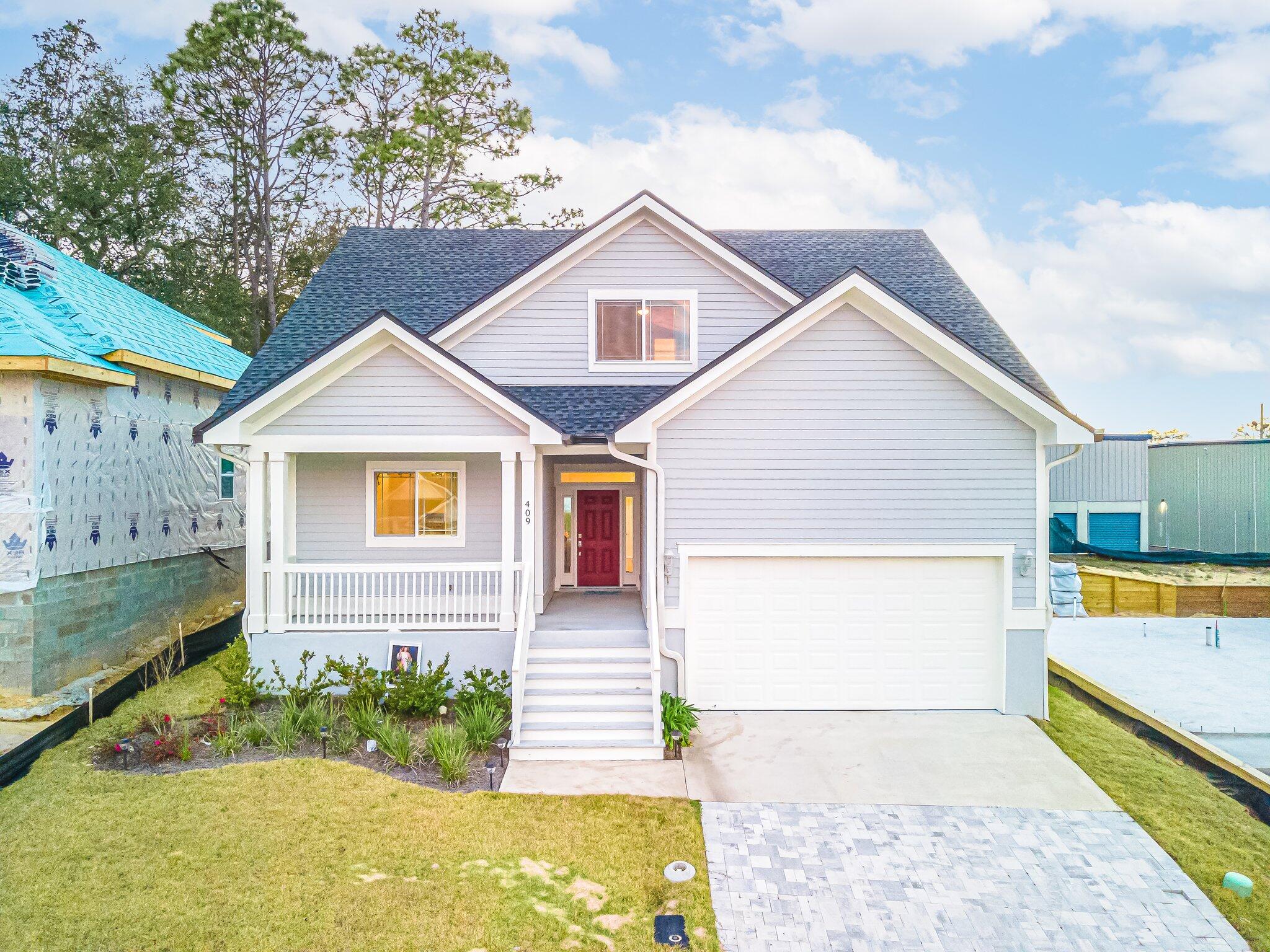 This 4 bedroom and 2 1/2 bath home is a must see! If the built in fireplace, tray and Vaulted ceilings on the first floor do not catch your eye, you are sure to love the grill out area off the triple slider. Be sure to check out the tile showers, granite counter tops, wooden cabinets and all of the closet space! A Florida must have of hurricane rated windows & doors are present as well.  Enjoy cooking on the gas stove! Along with this 2 A/C unit home is a Ranai gas water heater! Come checkout this great home in a very sought after location only 5 minutes from the back gate of Eglin AFB! Oh and did we mention this home has a first floor master suite?
