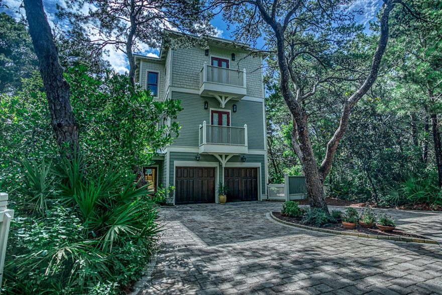 REDUCED PRICE on this Beautiful Custom Home! One Owner. Never Rented. Impeccably Maintained.You'll love this gorgeous home located just a short walk to either of two county maintained public beach walkovers in the desirable Eastern Lake area of Seagrove Beach. Some of its many features include hardwood floors, 10' ceilings, pretty crown molding, solid interior doors, and custom closets. French doors open to private sheltered decks extending across the back of the home on all three floors.You'll feel like you are in your own retreat up in the tree tops yet the sugar-sand gulf beaches are beckoning from ~0.2 mi away! The three-story foyer, nine sets of French doors, and generous windows ensure abundant natural light in every room.There is great space for entertaining family and