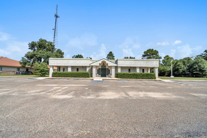 This is a one-story medical arts building located just a block from the hospital in Crestview, Okaloosa County, Florida 32536 with 30+/- parking spaces siting on 1.14 ac (49,800 sf). Expansion maybe possible on both sides of the building. Location is minutes from I-10, Hwy 85 and Hwy 90.  This area is served by freight and has a high capacity general aviation community.  This subject area is populated by medical service organizations and demand for medical services continues to grow in Crestview as population and demand increase.  You enter the building into the reception area which was used for two different end users.  There are many exam rooms, MRI & CT rooms, a large kitchen, offices and many rest rooms.  Endless possibilities for medical uses.  Location across from the local hospital