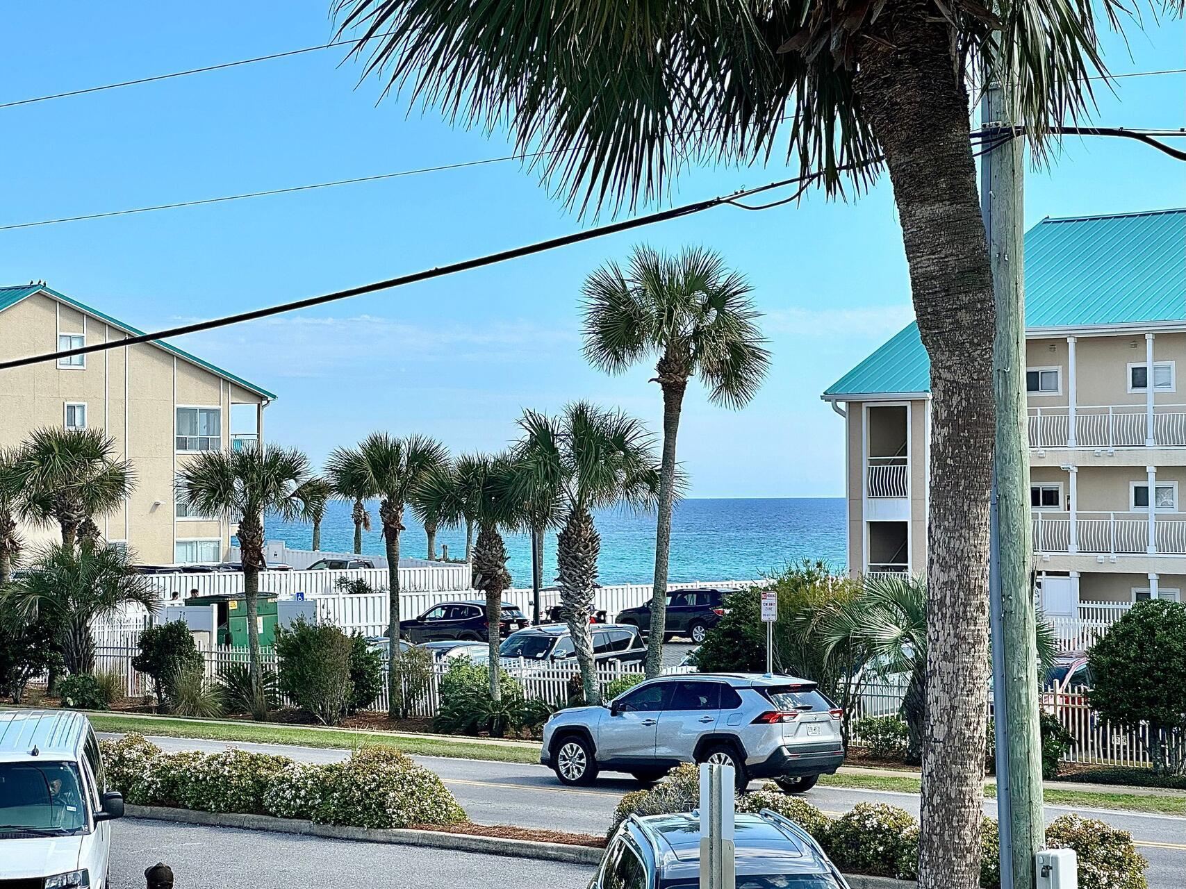Experience the charm of this exquisite one-bedroom, one-bathroom condominium offering stunning views of the Gulf of Mexico. Offered fully furnished and turnkey rental ready with a rental history (some owner usage) 30k plus. Milestone inspection completed and approved.Amenities include heated pool, hot tub, and a communal grilling area. Milestone inspection completed and approved.
