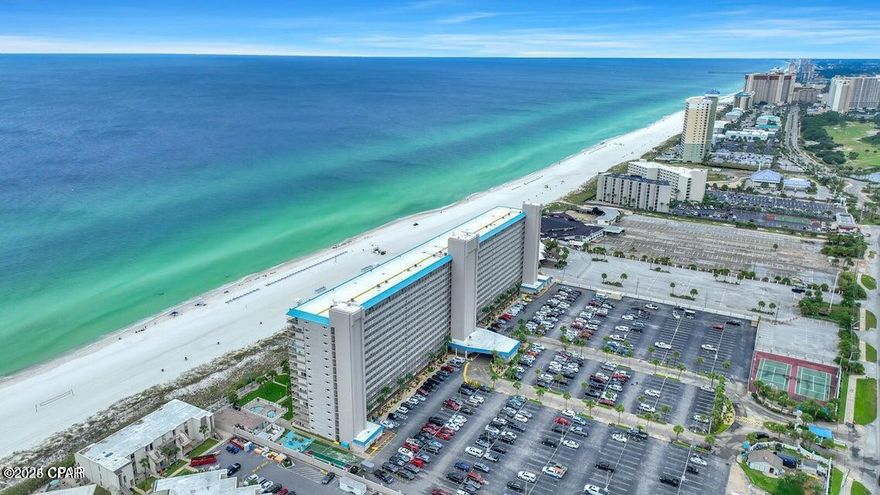 ***SELLER WILL CONSIDER ALL OFFERS!***The Summit is a long-beloved vacation spot for generations of visitors to Panama City Beach, and unit 1012 is ready for you to take part!This condo unit is fully furnished as a short-term rental and features the following: --Private bedroom with new LVP flooring--En-suite bath off the main bedroom with shower/tub combo--2 twin bunks in the hall--Half bath in the hall--Sleeper sofa in living room--Compact kitchen with all necessities--Extra counter space, drawers, and cabinets--Full size Amana washer and dryer--Tile in hall, baths, and kitchen/dining/living room--GE electric stove--Built-in microwave--Hotpoint refrigerator--Double sink--Dining table with 4 chairs--7' x 15' balcony with outdoor furniture The Summit grounds feature a gated entrance, 24-hour security, 2 pools (one heated seasonally), 2 hot tubs, 2 kiddie pools, a poolside Tiki Bar, a full-service restaurant (Bikini Bob's), fitness center, game room, ice cream/snack and gift shops, jet ski rentals, shuffleboard, and lighted tennis/pickleball courts.