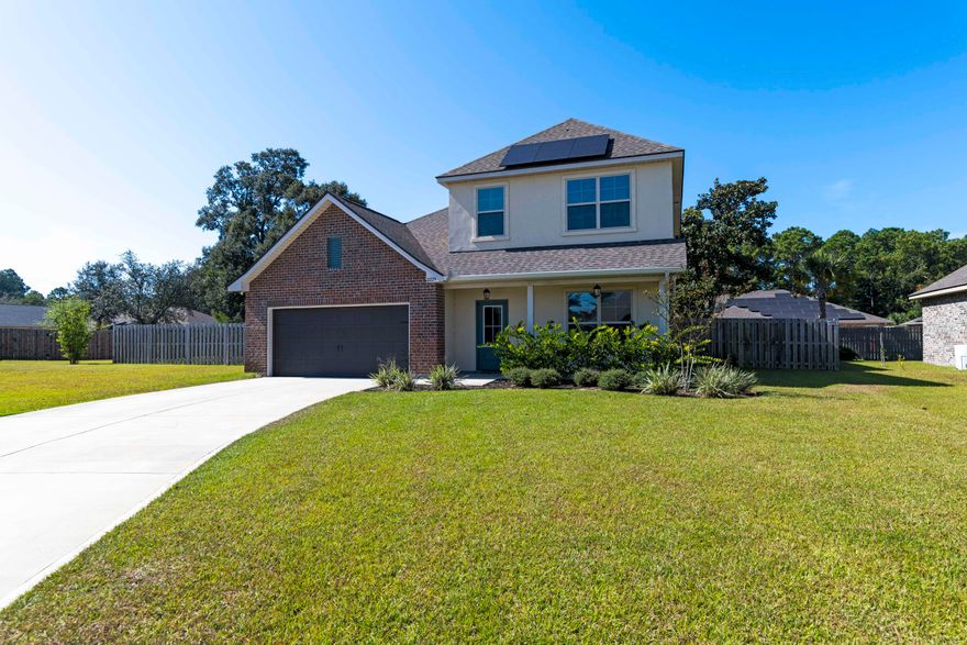 Lovely family home in Gulf Breeze! This 2-story home gives you 4 bedrooms, 2.5 bathrooms, and a roomy 1921 sq ft of living space. The first floor offers a fantastic open floor plan, separate dining room and tile flooring. The kitchen is equipped with all stainless-steel appliances, granite counter tops, and access to the spacious backyard from the exterior door. This beautiful home also boasts a large primary suite with a walk-in closet for easy access to all your clothes. You'll also love the landscaped yard, oversized 2-car garage, and solar panels that come with the house! Located near a public boat ramp and minutes away from both Pensacola and Navarre Beaches. This home sits on a quiet cul-de-sac in the highly coveted Santa Rosa School District.