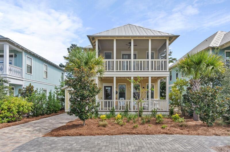 Welcome to 'Cabana Banana,' a fully furnished 4-bedroom, 2.5-bathroom beach home located in Lakeside at Blue Mountain Beach community along Scenic 30A. This meticulously maintained property combines upscale finishes with laid-back coastal charm, making it ideal as a primary residence, second home, or proven income-generating vacation rental. This home boasts an extremely impressive rental history, making it a great turnkey investment opportunity.Interior highlights include hardwood and tile flooring, shiplap accents, designer lighting, and plantation shutters throughout. The open concept living area flows into a beautiful gourmet kitchen with quartz countertops, a custom tile backsplash, and a large center island perfect for entertaining.
Outdoor spaces include a spacious front porch with swinging bed, a screened second-story porch, and a private backyard featuring a paver patio, grill, fire pit, and outdoor shower. The garage doubles as storage for all the necessary beach toys and golf cart while also home to an outdoor fridge and ping pong table.
Lakeside at Blue Mountain amenities include a community pool, small community library/puzzle room, clubhouse, and scenic walking paths. Located just a short walk or bike ride to beach access, local shops, restaurants, and everything 30A has to offer.
Don't miss the opportunity to own this charming beach home in Blue Mountain Beach!