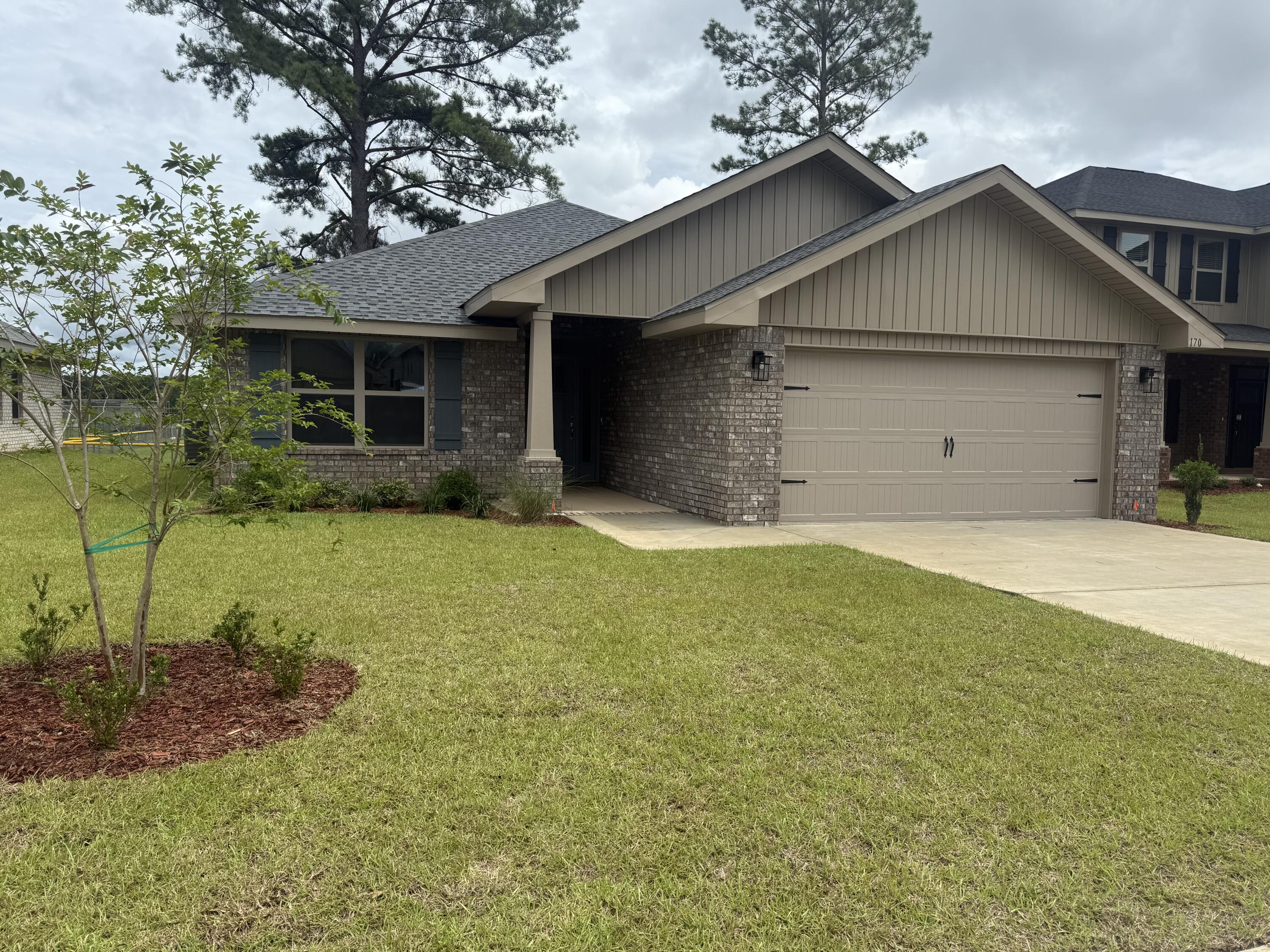 T his patio plan is the one for you! This home is 1820 sq ft, 4 sided brick with many upgrades! This is a craftsman style that comes with complete auto timed irrigation as well as professional landscaping and sod. There is a formal dining room as well as a breakfast nook and breakfast bar which is adorned with white lace quartz countertops. Youll see LVP throughout except for bedrooms which are carpeted. This is a split floorplan with the master bedroom having a large bathroom with double vanities and a large walk in closet in the bedroom. The master b bath has also been upgraded with a 5' shower in lieu of a tub. Leave the great room and enter a 13' x 8' covered porch. Appliances are stainless and there is washer/dryer hook ups in the laundry room. Come out and see your next home!