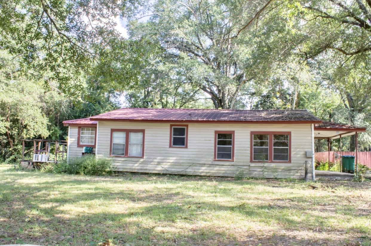 Great piece of land located in south Crestview. This home is for someone who would like to have a Reno project, or to rebuild on this large corner lot. Take a look and imagine the possibilities. This home is centrally located for easy access in and out of town. The home right behind (645 E Walnut) Can be purchased for one sale, TWO HOMES for $70,000. Both lots equal .56 acres. Call For more information.