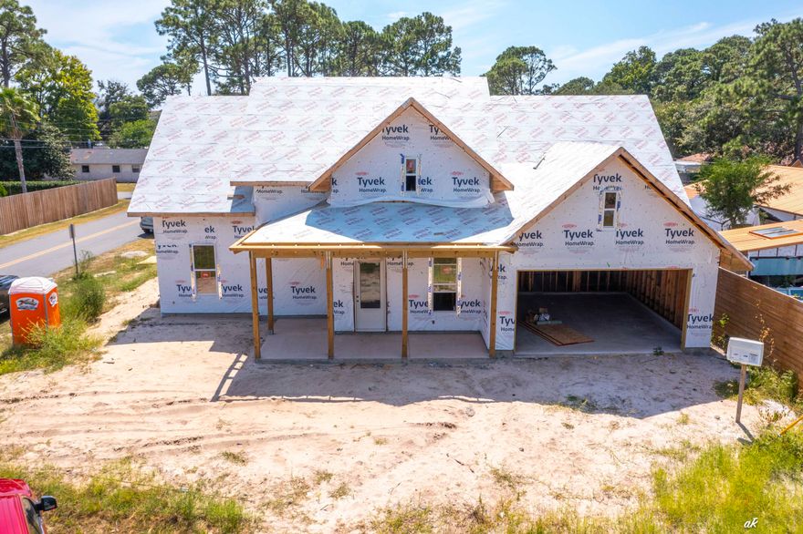 New Construction Opportunity - 7213 North Lagoon Drive, Panama City Beach, FL. Be among the first to own this stunning new construction home, just 90 days from completion! Nestled on the highly sought-after East end of Panama City Beach, this beautifully designed residence is just steps from the lagoon and boat ramps, 2 minutes to the Gulf of Mexico, and a short drive to Pier Park, local marinas, and great restaurants. Featuring a modern layout, this two-story home boasts: Open-concept living spaces, Luxury Vinyl Plank (LVP) flooring, Quartz countertops, Energy-efficient spray foam insulation, Tankless water heater, Spacious bedrooms and bathrooms, Covered outdoor living space. There's still time to customize your interior selections, including colors and select finishes. Make it truly your own! Don't miss this opportunity to live in one of PCB's most desirable areas with no HOA and all the benefits of modern, coastal living. Call for additional detail and visit 7213 North Lagoon Drive - Where comfort meets convenience near the water! Call today for additional details!