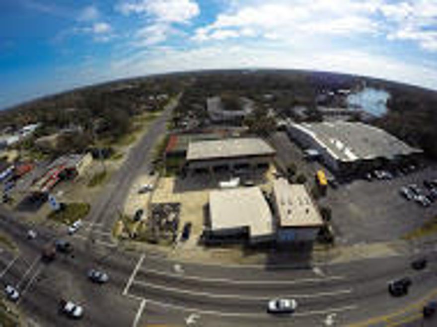 High traffic corner location with over 49,000 cars passing by per day. 2 buildings totaling 15000 sq ft, current business is a truck accessories business, property has many unique features for the right buyer..