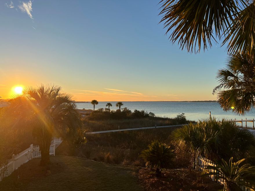 Imagine Paradise..soft breezes... sugar white sand. lulling surf. Live your dream with breathtaking views of the Navarre sound from two decks! Enjoy morning coffee or afternoon drinks from your private Oasis! located minutes from the Gulf Islands National seashore on the peaceful sound waters of Navarre Beach, this 3-story home offers an open floor plan with full panoramic views. Two blocks from the Gulf of Mexico! This amazing 1938 sq.ft waterfront/water-view home with 3 bdrms, 2.5 baths, exhibits full Sunset views of the Inter-coastal Waterway, community boat dock and courtesy slips. Two bedrooms on main floor with Jack and Jill Bath; Large open Living Area/Dining area; Kitchen is open to Living Area; Refrigerator and Stove Stainless Steel; New dishwasher; Beautiful white diamond quartz