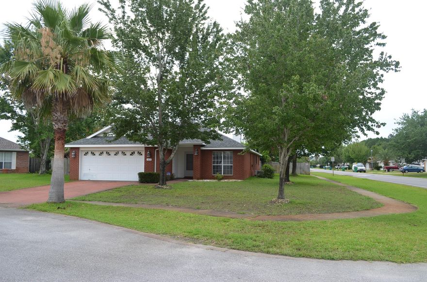 If you want to be away from the hustle and bustle, yet close to all that Destin has to offer, then this home is for you. Located on a tree shaded, large corner lot in a cul-de-sac, with a large in-ground swimming pool, this lovely home offers a split floor plan, with 3 bedrooms, 2 baths, and an additional area off the foyer that can be used as an additional dining area or home office. New roof in 2016, new A/C in 2015, new hot water heater 2017. The master bedroom offers a walk-in closet and large master bath with jetted tub and separate shower. And there are no stairs to climb! And NO HOA FEES! This home is in a desirable area and will not last long. Make your appointment today and start making the memories of a lifetime in beautiful Destin Florida.