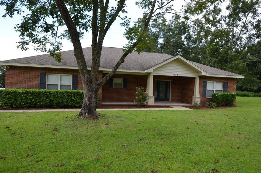 This one will not last! Built in just 2007 and resting on just over 1 acre, this all brick custom 3 bedroom 2 bath house is one to see! Right at 1700 square feet this gorgeous home has side entry 2 car garage, privacy fenced area at rear of home with above ground pool. Pool is surrounded by a large deck which is perfect for sunbathing and entertaining. For extra storage, there is an additional powered storage and separate office, which has heating and air conditioning. Perfect for a small home based business. Make note -- walls are 2x6 construction for additional insulation and strength! Inside you will find open great room concept with hard wood floors in the living room, tile in the dining, kitchen, laundry and baths, and carpet in bedrooms. Upgraded molding can be seen throughout the